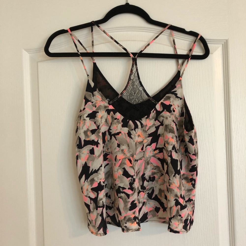 Group of three tank top that fits size 4-6